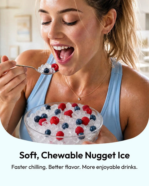 Woman enjoying soft, chewable nugget ice from a bowl with berries, showcasing premium_countertop_nugget_ice_maker_rapidly_chills_your_kitchen_with_up_to_35_pounds_of_smooth_crushed_ice_daily_featuring_a_lightning_fast_five_minute_production,_zero_hassle_self_cleaning,_and_game_changing_reliable_build_for_every_busy_american_househo.