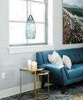 Living room with Edishine Handcrafted Art Glass Pendant Light With Turquoise Blue Swirl Shade, Plug In Hanging Light over table.