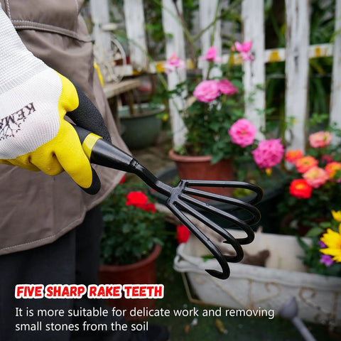 Gardener holding Five Claw Hand Rake and Weeder Cultivator for Small Gardens near flower beds