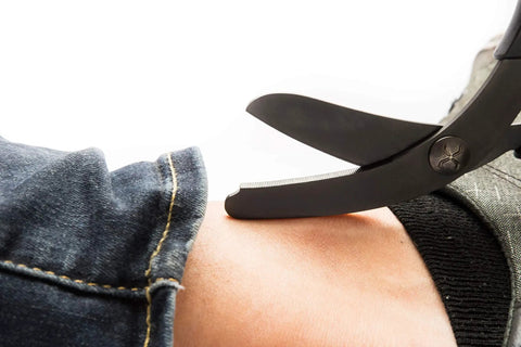 Seven Point Five Inch Black Titanium Coated Trauma Shears Built Tough For Paramedics EMTs Nurses And Emergency Pros Extreme Duty Medical Scissors With Hardened Steel Blades cutting denim