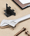 Two Pack Stainless Steel Shelf Brackets With Square Pipe Design with wrench and screws on table