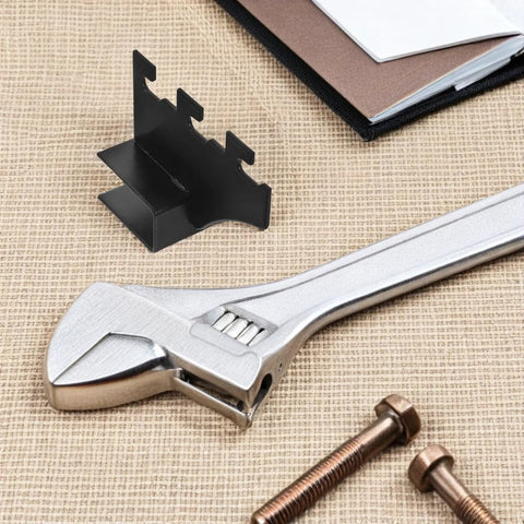 Two Pack Stainless Steel Shelf Brackets With Square Pipe Design with wrench and screws on table