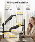 Installed vertical dual monitor stand for 17 to 32 inch screens, stacked mount with full motion tilt swivel and rotation shown in office.