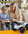 Child with All Terrain RC Car Monster Truck With LED Lights 1:18 Scale 2.4GHz Remote Control Off Road Toy gift box.