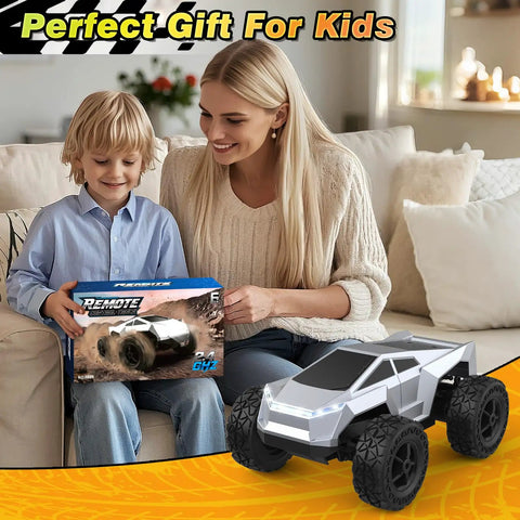 Child with All Terrain RC Car Monster Truck With LED Lights 1:18 Scale 2.4GHz Remote Control Off Road Toy gift box.