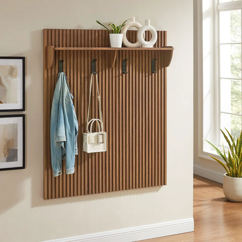 Mid Century Modern Fluted Walnut Wall Mount Coat Rack Panel With Roomy Shelf And Hella Sturdy Hooks For Entryway Hallway Mudroom Sweet Wall Organized Storage Setup With Groovy Wood Grain Details featuring jackets and bags hung neatly.