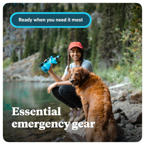 Woman and dog by lake with Palm Sized Mini Water Filtration System SP128 Blue For Hiking Camping Travel And Emergency Prep.