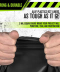 Hands stretching Beefy 55 Gallon Heavy Duty Trash Bags Black 2.0 Mil Thick Drum Liner For Toter And Contractors 38 X 58 Inches