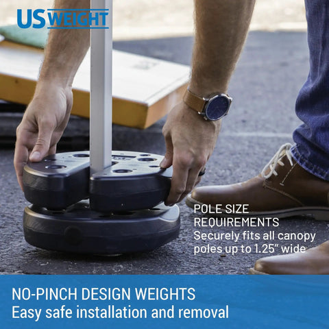 Person securing canopy pole with Set Of Four 40 Pound Canopy Weights With Carry Strap Heavy Duty No Pinch Design For Easy Installation