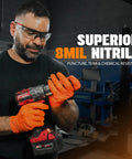Kickass Heavy Duty 8 Mil Orange Nitrile Gloves With Diamond Textured Grip, Latex And Powder Free For Industrial Mechanic Shops, Ultra Thick Chemical Resistant Protection, 10 Pack Large worn by a worker using a power drill.