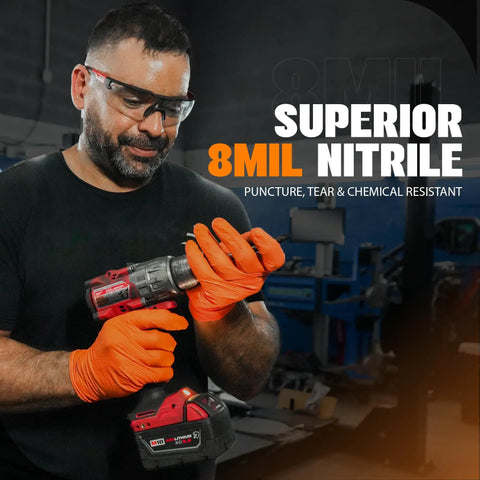 Kickass Heavy Duty 8 Mil Orange Nitrile Gloves With Diamond Textured Grip, Latex And Powder Free For Industrial Mechanic Shops, Ultra Thick Chemical Resistant Protection, 10 Pack Large worn by a worker using a power drill.