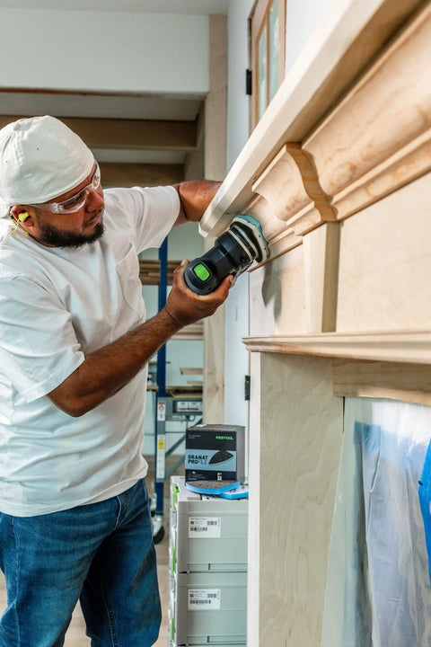 Craftsman using Granat PRO Soft Delta Sanding Pads 10 Pack For Contours, Corners, And Moldings With Flexible Foam Backing