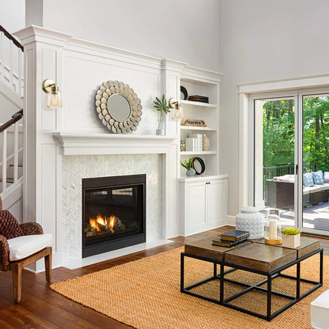 Living room with Dope 1 Light Plug In Or Hardwire Wall Sconce In Matte Brass With Smoked Amber Glass Shade, fireplace, and decor.