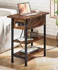 End Table With Charging Station And USB Ports, Flip Top Side Table With Two USB Ports And One AC Outlet, Three Tier Small Storage Table For Small Spaces, The Ultimate Space Saver For Your Living Room Or Bedroom, Brown Finish. Image shows brown finished table in living room setting with laptop on top.
