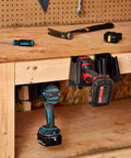 Universal Drill Holder And Power Tool Organizer Wall Mount Rack For Cordless Drills And Drivers displayed on wooden shelf