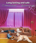 Living room with pink LED lighting and couch, showing 100 Ft Bluetooth LED Strip Lights With Music Sync And Color Changing 5050 RGB Tape Lighting