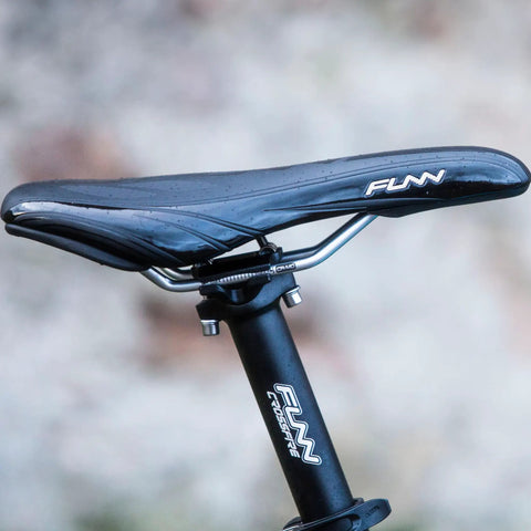 Side view of Crossfire Bike Seat Post 350mm Length, 27.2mm Diameter, AL6061 Aluminum, 3D Forged One-Piece Head and Shaft on a bike