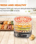 Heavy Duty 5 Tier Food Dehydrator Machine With 48 Hour Delay Timer And Easy Spin Dials displaying dehydrated fruits and vegetables.