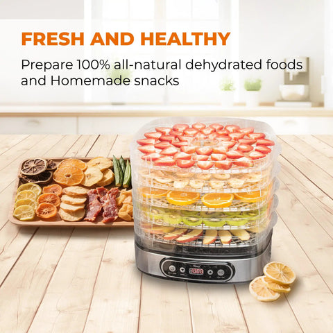Heavy Duty 5 Tier Food Dehydrator Machine With 48 Hour Delay Timer And Easy Spin Dials displaying dehydrated fruits and vegetables.