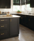 Kitchen with black cabinets fitted with Champagne Bronze Cabinet Handles 10 Pack 3 Inch 76mm Center To Center Traditional Drawer Pulls.