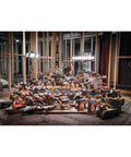 Heavy Duty Cordless Hammer Drill Driver With Battery And Charger, 18 Volt Job Site Beast showcased among various power tools in a construction site.
