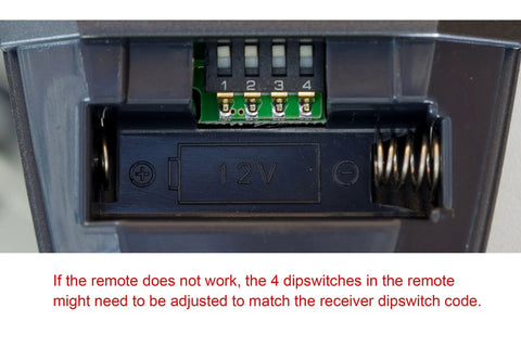Close-up of 4 dipswitches in Replacement Wireless Ceiling Fan Remote For UC7083T Black Controller With Dual Light Control.