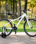 White bike with Training Wheels Set For 16 18 20 22 24 Inch Bikes With Steel Adjustable Bracket And Hardware Pack in park setting