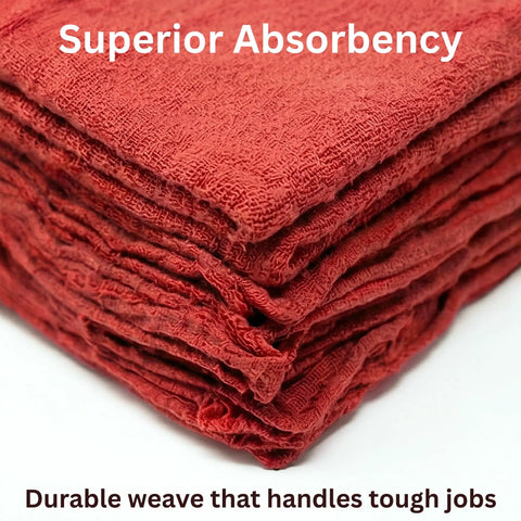 Close-up of folded red cotton shop towels showcasing texture and absorbency, part of 12 pack for garage and auto care.