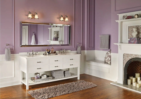 Wynford 24 Inch Single Towel Bar in Brushed Nickel Finish for bathrooms, mounted above a white vanity in a purple bathroom