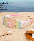 Unisex Sports Sunglasses For Men Women And Teens With UV400 Protection Wraparound Wide View One Piece Frame on sandy beach