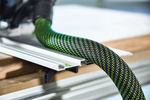 Heavy Duty Suction Hose 27 By 32 Millimeter By Five Meter For CT Dust Extractors Including CT 15 25 26 36 48 And CT Mini Midi From 2019 Onward With Flexible Inner Core And Rugged Outer Skin For Easy Snag Free Setup attached to cutting tool on workbench.