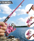 Telescopic Fishing Rod And Reel Combo For Ladies Pink Spinning Pole Set For Beginners Women Includes Line And Essential Accessories For Easy Portable Fishing Great Starter Kit That Fits In A Backpack by a lake