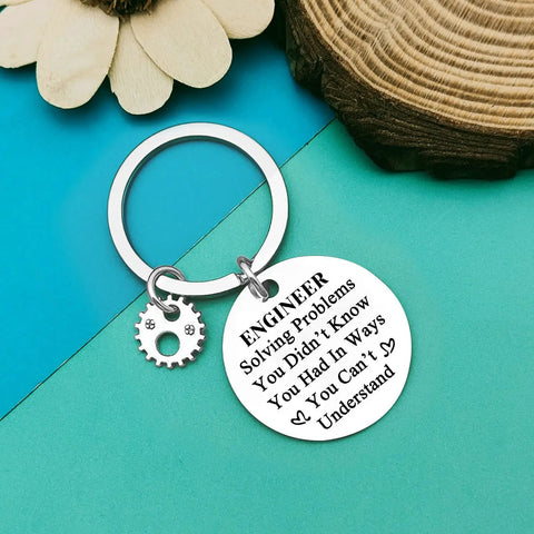 Keychain Gift For Students And Pros Alike A Funny Yet Practical Graduation Token For Mechanical Civil Architectural Software And Electrical Engineers And A Great Teacher Appreciation Gift, 30mm stainless steel pendant with engraved text and gear charm.