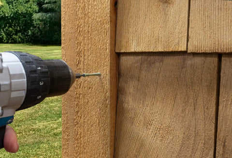 Using a drill with No Sweat Finish Trim Screws #7 X 2 In Tan Exterior Coating for deck installation on wood.