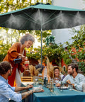 Misting Cooling System For Patio And Garden 82Ft Water Mist Hose With 30 Brass Nozzles cooling a dining setup outdoors