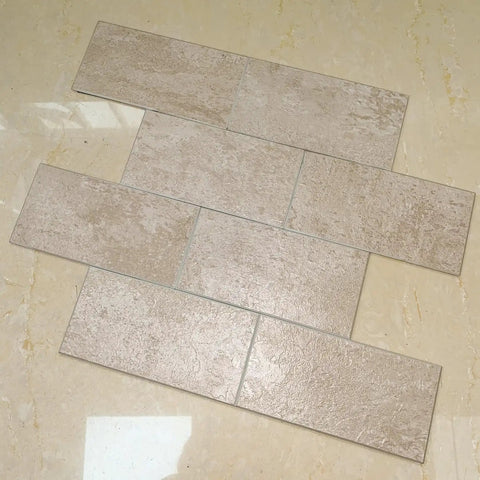 Peel And Stick Stone Tile Backsplash Kit, 10 Sheets, Subway Roman Travertine Veneer on floor, showcasing texture and style