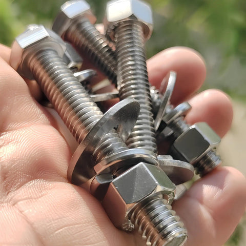 Tough-As-Nails 3/8-16 X 5 Stainless Steel Hex Bolts With Nuts, Flat And Lock Washers, 18-8 304 Stainless in hand outdoors