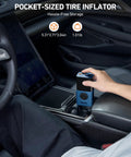 On The Go Portable Tire Inflator L7S Cordless Air Compressor With Digital Dual Value Display in a car center console.