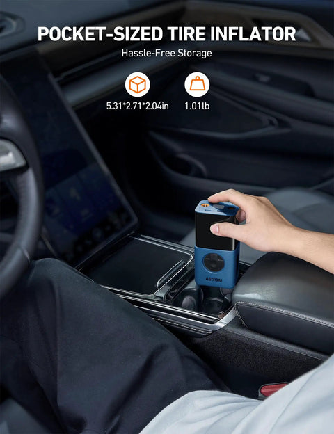 On The Go Portable Tire Inflator L7S Cordless Air Compressor With Digital Dual Value Display in a car center console.