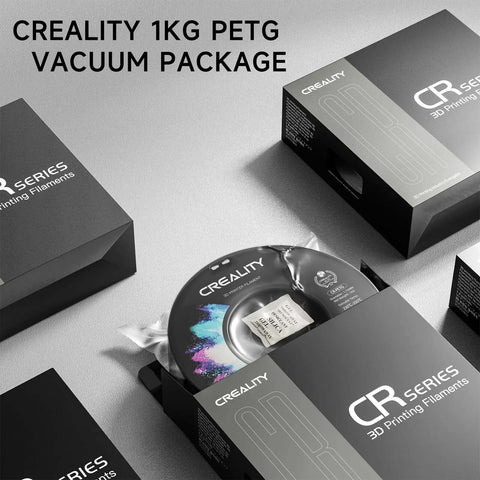 Creality 1kg PETG spool vacuum packaged for 3D printing, black color, with box labeled 'CR Series 3D Printing Filaments'.