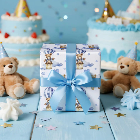 Gift wrapped in Blue Teddy Bear Hot Air Balloon Baby Wrapping Paper Roll For Baby Boy Birthday And Baby Shower Mini Roll 17 Inches By 32.8 Feet 46 Sq Ft Totally Cute Gift Wrap with blue ribbon.