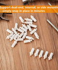 No Grunt Work Needed Spring Loaded Shutter Repair Pins For Plantation Blinds 30 Piece Replacement Kit on wooden surface.
