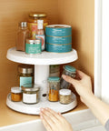 Game Changer Two Tier Height Adjustable Lazy Susan Turntable With Smooth 360 Swivel For Kitchen Cabinet And Pantry Organization And Quick Access Storage In White, storing spices and jars.