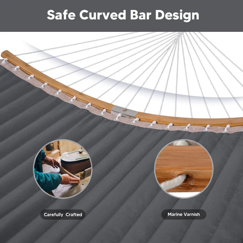 Detail of curved spreader bar and quilted fabric on Double Portable Hammock With Stand For Two People, Dark Gray.