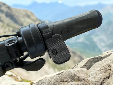 Universal Thumb Throttle Adapter For E Bikes Converts Twist To Thumb Control With A Big Paddle For Cleaner Grip And Way Less Thumb Strain So You Can Cruise Longer On Any Popular E Bike