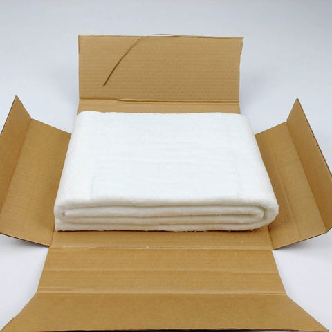Front view: white ceramic fiber insulation blanket, 1/4 in thick, 16 x 48 in, folded in an open cardboard box.