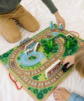 Portable Wooden Railroad Tabletop Playset With Magnetic Train Cars And Animal Scenery For Toddlers And Preschoolers Age Three Plus Legit Awesome Travel Kit, kids playing with train and landscape.