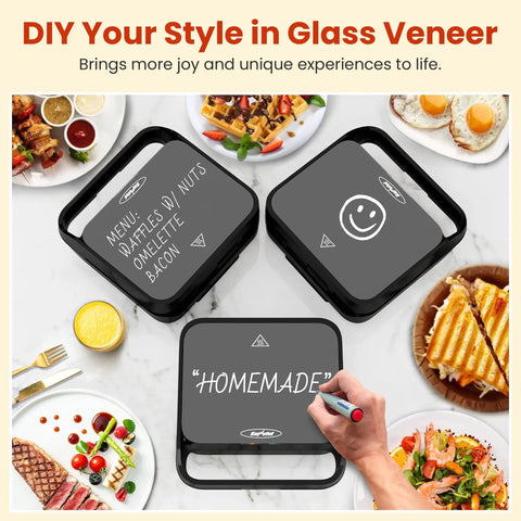 Royalcraft 3-in-1 Electric Sandwich Maker & Waffle Grill with customizable glass veneer tops in black, showcasing smiley and menu designs.