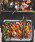 Grill Pan Set Of 2 Stainless Steel Perforated Grilling Baskets With Handles For Outdoor BBQ, showcasing vegetables and spices