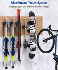 Durable Ski Wall Rack with Nonslip Rubber Grips Stores Winter Gear Safely in Garage or Shop holding skis and snowboard securely on wall.